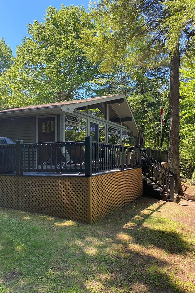 Cottage 53 large deck viewed from the lake